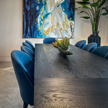 Transitional Dining Room with Blue and Gold Accents