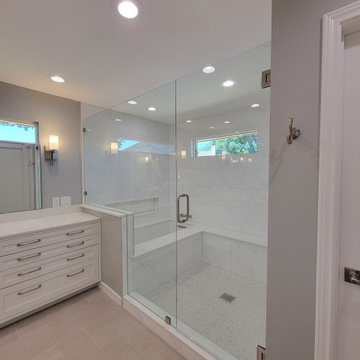 Two separate bathrooms converted into a master bathroom with a big open closet