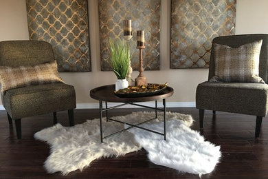 Family room - mid-sized contemporary open concept dark wood floor family room idea in Los Angeles with beige walls, no fireplace and no tv