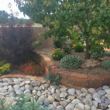 Block Rock Border with River Rock Drainage