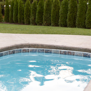 freeform beach entry with lap lane gunite pool