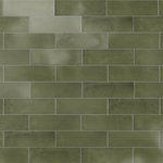 Merola Tile - Coco Glossy Moss Verde Porcelain Wall Tile - Offering a subway look, our Coco Glossy Moss Verde Porcelain Wall Tile features a smooth, glossy finish, providing decorative appeal that adapts to a variety of stylistic contexts. Containing 100 different print variations that are randomly distributed throughout each case, this green rectangle tile offers a one-of-a-kind look. With its impervious, frost-resistant features, this tile is an ideal selection for both indoor and outdoor commercial and residential installations, including kitchens, bathrooms, backsplashes, showers, hallways and fireplace facades. This tile is a perfect choice on its own or paired with other products in the Coco Collection. Tile is the better choice for your space!