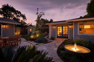 Inspiration for a mid-sized traditional backyard landscaping in Sacramento.