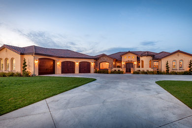 Example of a tuscan exterior home design in Other