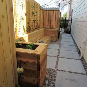 A Grass Alley Becomes a Relaxing Spot to Sit and Grow Herbs and Flower
