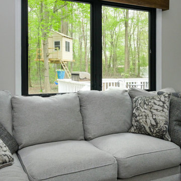 Black Double Casement Window in Attractive Family Room - Renewal by Andersen NJ