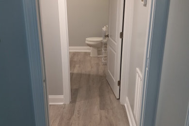 Inspiration for a hallway remodel in Other with white walls
