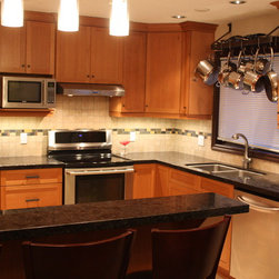 Warm and Inviting RIft Oak Spice - Kitchen Cabinetry