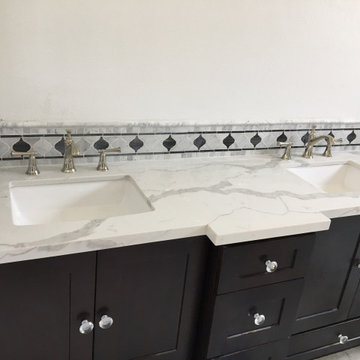 Espresso shaker bathroom vanity with Calacatta Gold quartz bathroom countertop