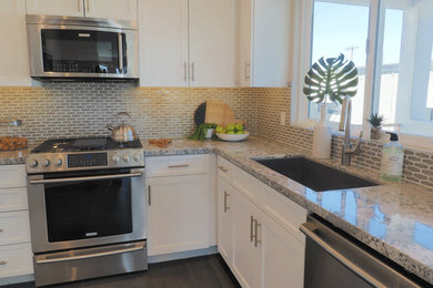 Example of a transitional kitchen design in Orange County