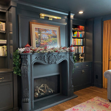 Monochromatic Fireside Elegance: A Radiant Transformation with Built-in Shelving