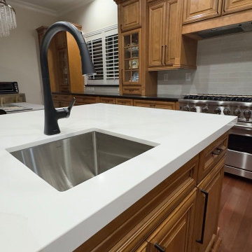 Classic Wood Kitchen with Modern Glass Backsplash