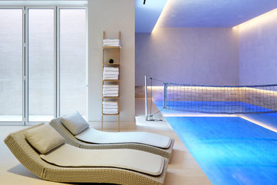 Design ideas for a large contemporary indoor rectangular lengths hot tub in London.