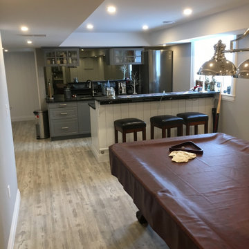 Basement Renovation with Entertainment and Exercise Space