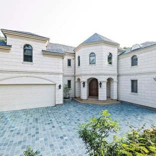 他の地域の地中海スタイルのおしゃれな白い家の写真