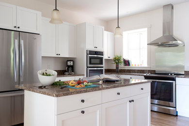 Example of a trendy kitchen design in Boston with an island