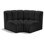 Meridian Furniture - Arc Vegan Leather Upholstered 2-Pc. Inward Curved Modular Sectional, Black - Unleash modern opulence with the Arc Vegan Leather 2pc. Sectional. Crafted for the modern connoisseur, this Sectional injects an air of refined luxury into any space. Its sleek silhouette, upholstered in supple black vegan leather, exudes timeless sophistication while the deep channel tufting adds textural intrigue, further elevating the chair's visual appeal. The modular design makes it a versatile chameleon, effortlessly adapting to your evolving needs and preferences. Whether you envision it gracing a chic living room corner, basking in the glow of a bedroom window, or adding a touch of drama to a home office, the Arc seamlessly complements your unique interior aesthetic.