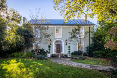 Example of a french country home design design in Charlotte