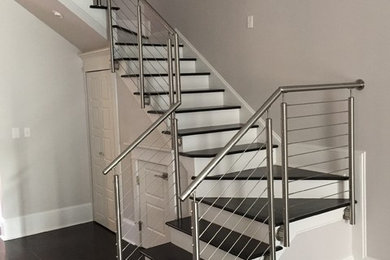 Staircase - contemporary staircase idea in New Orleans