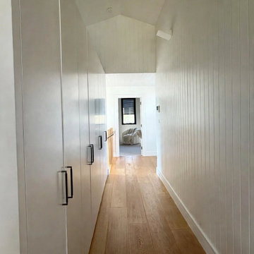 Upstairs hallway with built-in storage, North Willoughby