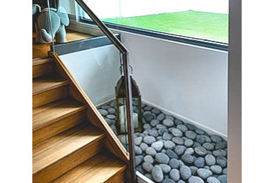 Inspiration for a medium sized modern straight staircase in Melbourne.