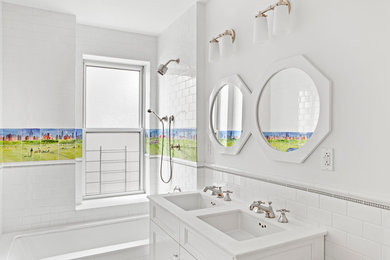 Trendy kids' multicolored tile and ceramic tile bathroom photo in New York with white walls