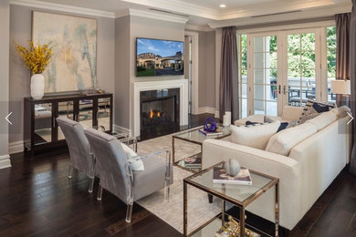 Example of a transitional living room design in New York