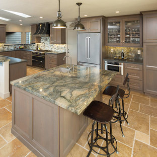 Mid-sized transitional kitchen pantry ideas - Example of a mid-sized transitional u-shaped travertine floor and beige floor kitchen pantry design in San Luis Obispo with an undermount sink, recessed-panel cabinets, gray cabinets, quartzite countertops, multicolored backsplash, glass tile backsplash, an island and stainless steel appliances