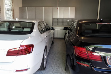 Garage - large contemporary attached two-car garage idea in Chicago