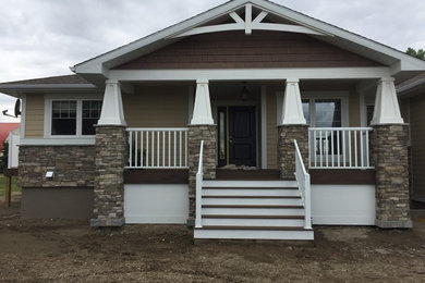 Example of an arts and crafts exterior home design in Other