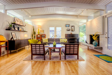 Example of an eclectic living room design in Seattle
