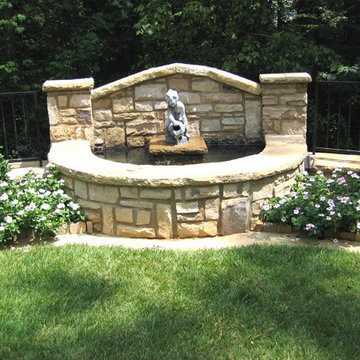 water feature, sculpture, Fieldstone columns sitting wall, edging and banding, w