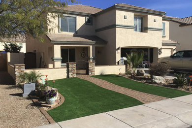 Example of a tuscan home design design in Phoenix