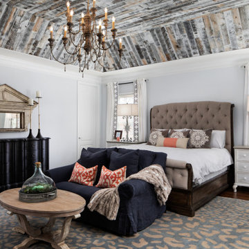Wood Tray Ceiling with Pops of Coral Master Suite