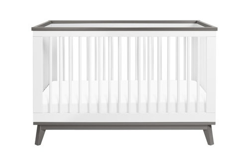 white crib with wood trim