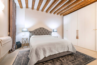 ヴェネツィアにあるトロピカルスタイルのおしゃれな寝室のインテリア