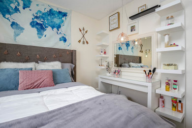 Inspiration for a modern girl laminate floor and gray floor kids' room remodel in Los Angeles with white walls