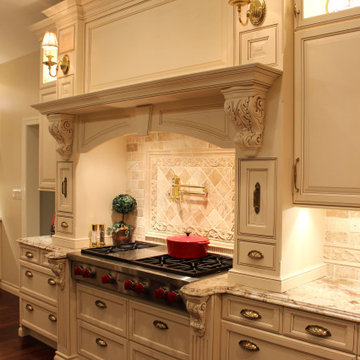 Luxurious Mediterranean Kitchen With A Custom Wood Hood And Hidden Pullout Spice