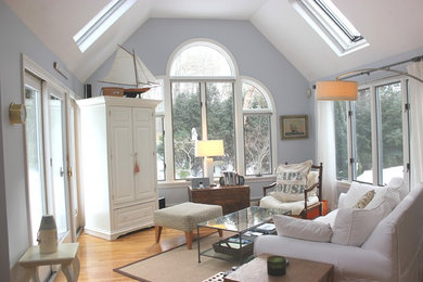 Mid-sized beach style open concept light wood floor living room photo in Boston