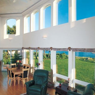 Houston great room with special shape arch windows by Gentek
