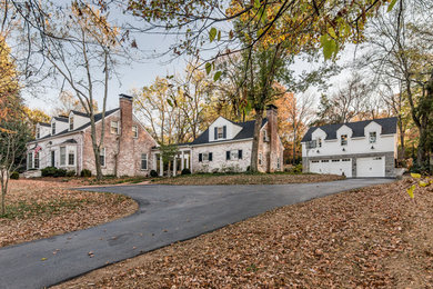 Inspiration for a mid-sized transitional two-story exterior home remodel in Nashville