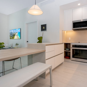 Modern Minimalism: Stylish Kitchen with Warm Accents in Miami