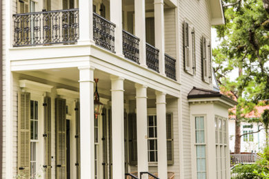 This is an example of a large traditional porch design in New Orleans.