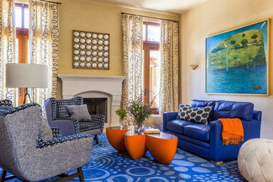 This is an example of a large eclectic formal open concept living room in San Francisco with yellow walls, a standard fireplace, a concrete fireplace surround, carpet and blue floor.