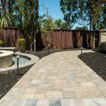 Walkway with interlocking pavers