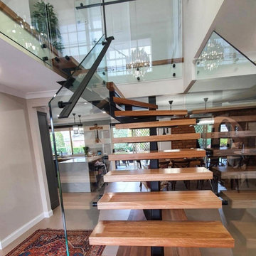 Main Entry, Staircase and gallery renovation - before and after