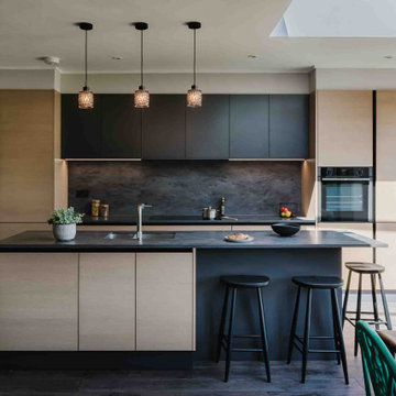 Zola Matte & Tavola Kitchen in Graphite & Parched Oak by Kitchens by Design