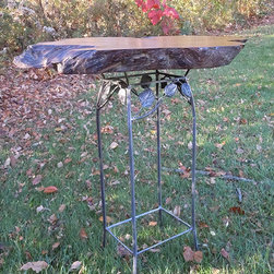 Live edge reclaimed tree stump side table with stylized wrought iron base - Side Tables And End Tables
