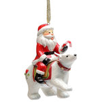 Cosmos Gifts Corp - Santa Riding Polar Bear Ornament - Decorate your Christmas tree with this classic ornament featuring Santa riding a polar bear. Made from hand-painted ceramic, this colorful ornament is festive and fun.