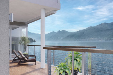 Beach style cable railing deck photo in Vancouver